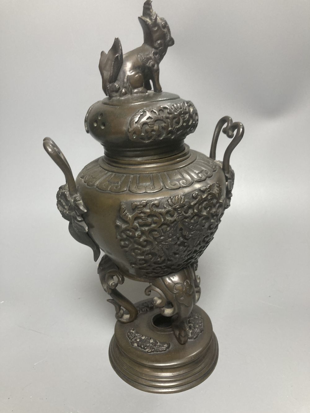 A Japanese ivory box and cover and a bronze koro and cover